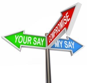 A sign with 3 arrows that say "your say," "compromise," and "my say"