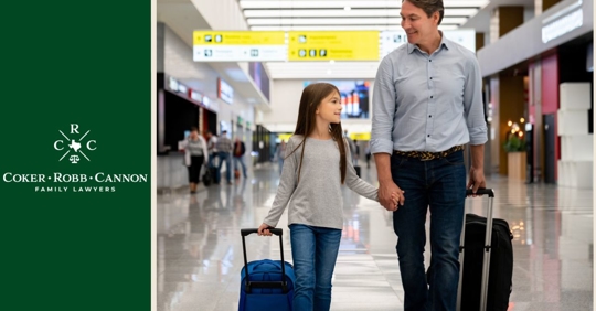 Dad and daughter walking through airport to go to spring break