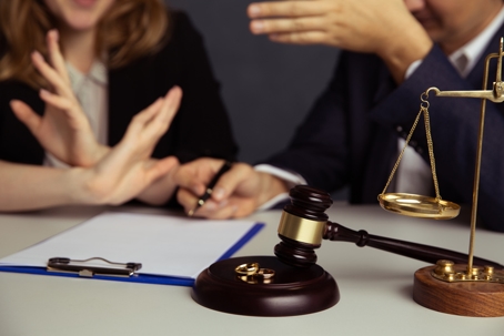 couple arguing in lawyer's office