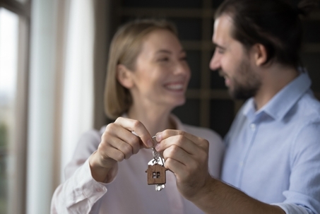 couple with house key